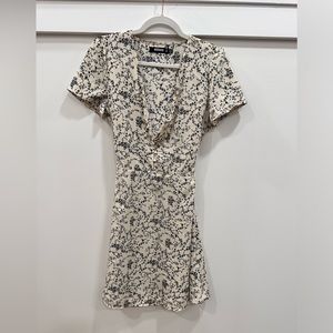 Skater dress. Tan and Black floral.